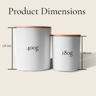 Two white containers with wooden lids and measurements on a beige background
